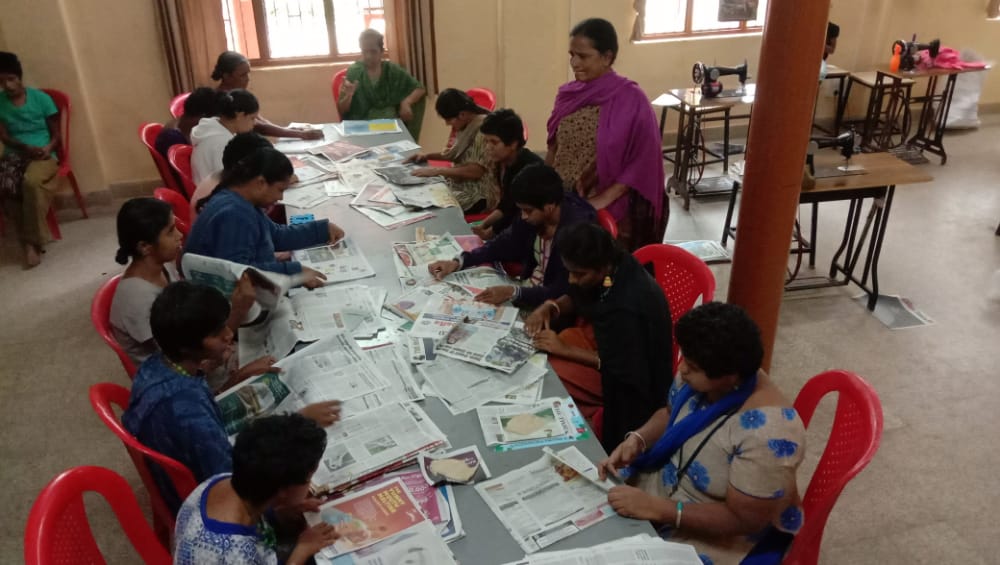 Differently-abled girls making bags